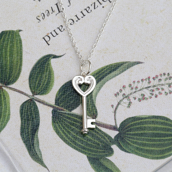 Silver koru heart key necklace