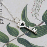 Silver koru heart key necklace
