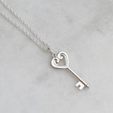 Sliver koru heart key necklace