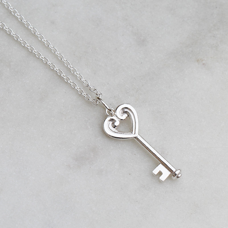 Sliver koru heart key necklace