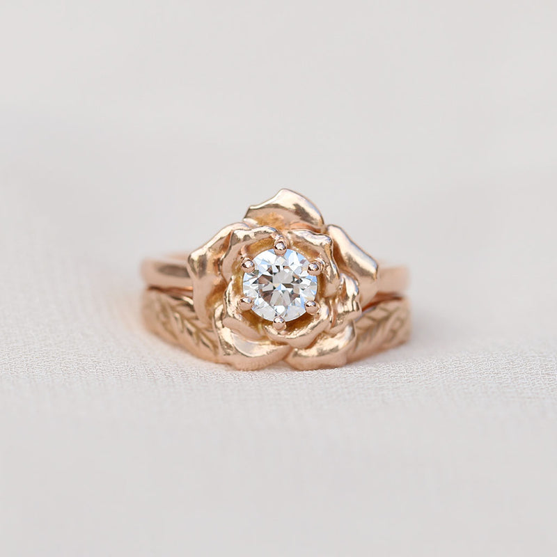 Rose ring with a diamond and a leaf ring