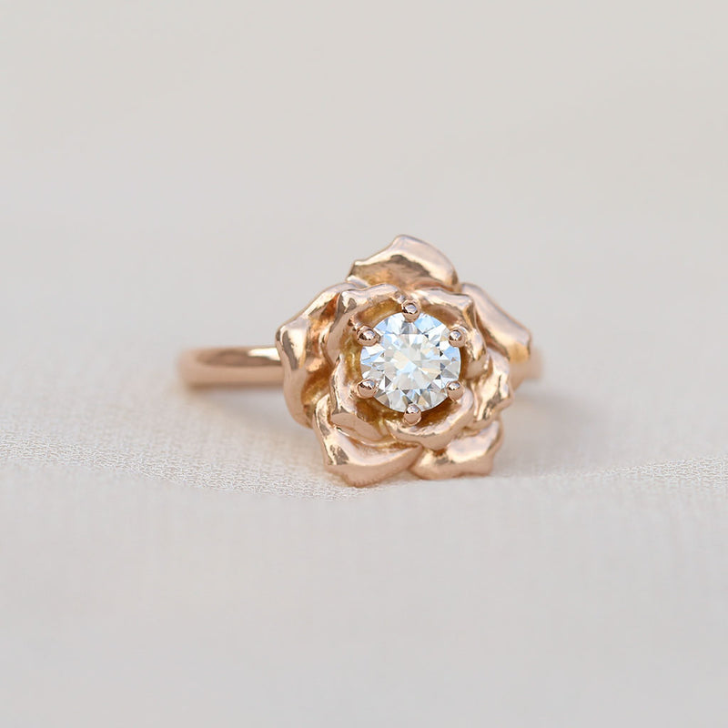 Rose ring with a diamond