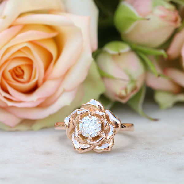 Rose engagement ring with a diamond