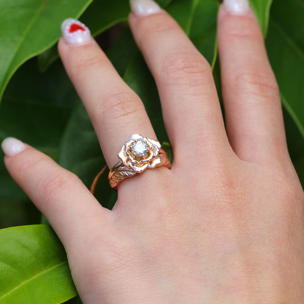 Rose engagement ring with a leaf wedding ring