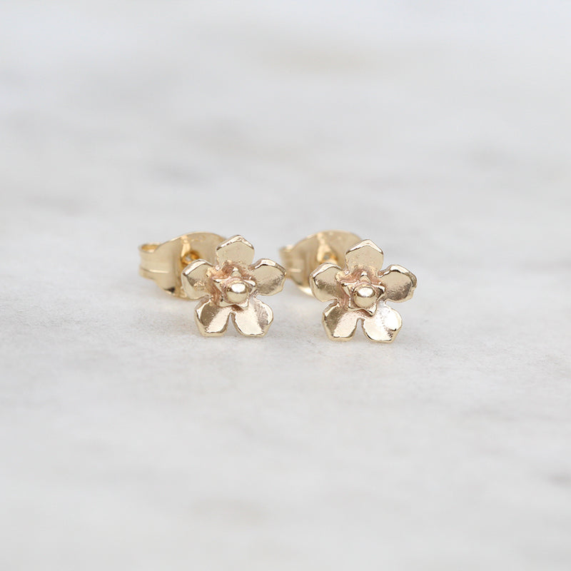 Mini gold forget me not earrings
