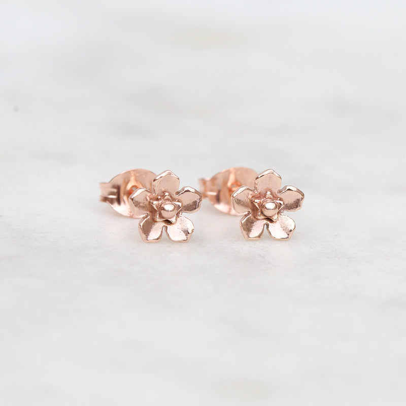 Mini rose gold forget me not earrings
