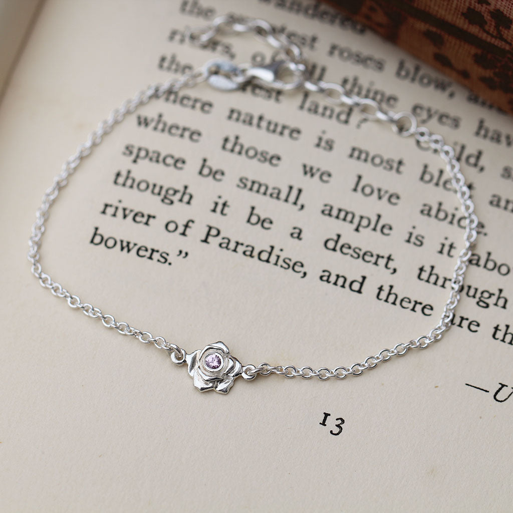 Mini rose bracelet in sterling silver with a pink sapphire