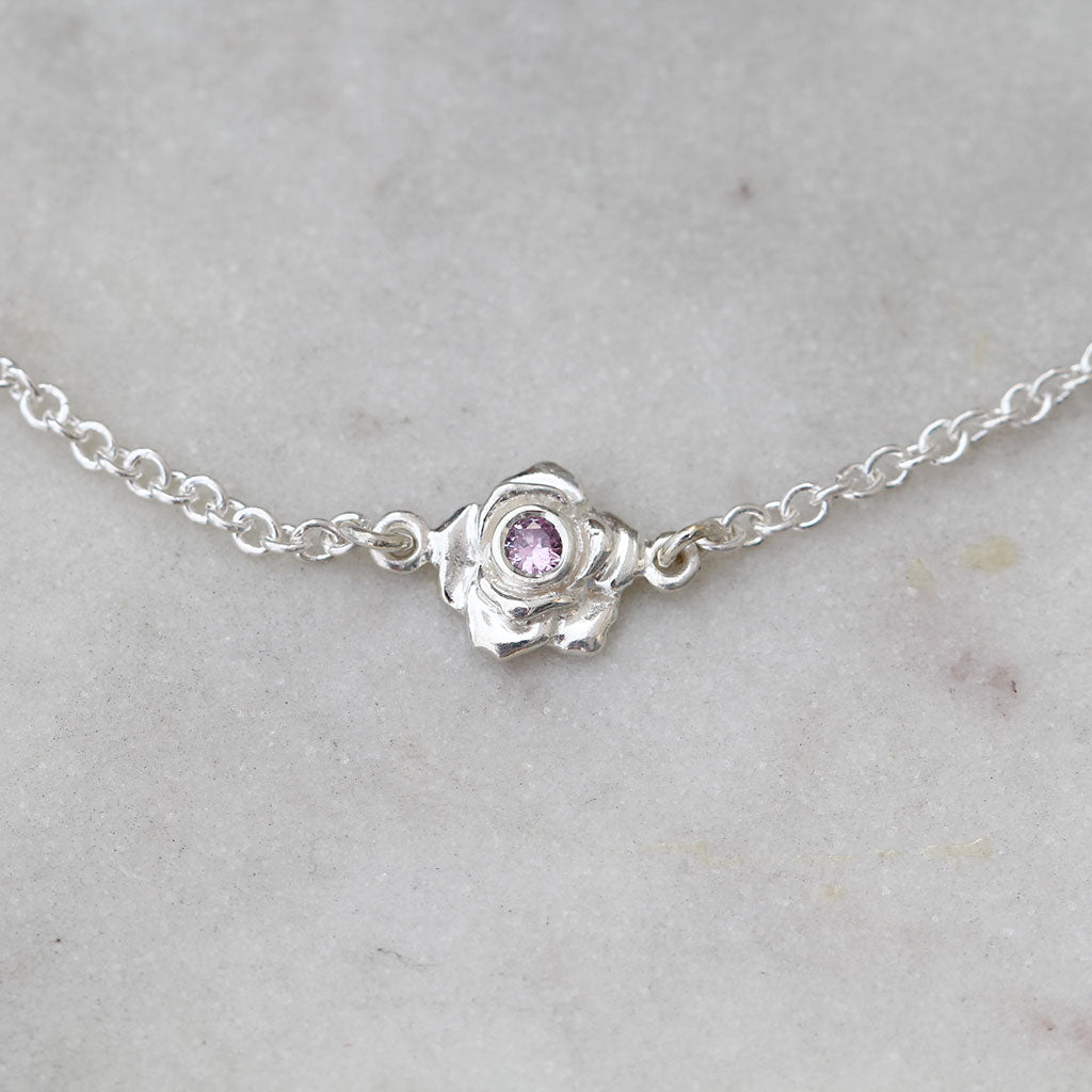 Mini ose bracelet in silver with a pink sapphire