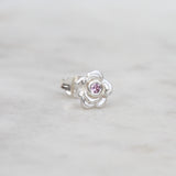 Silver rose stud with a pink sapphire