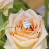 Rose earring in sterling silver with a pink sapphire