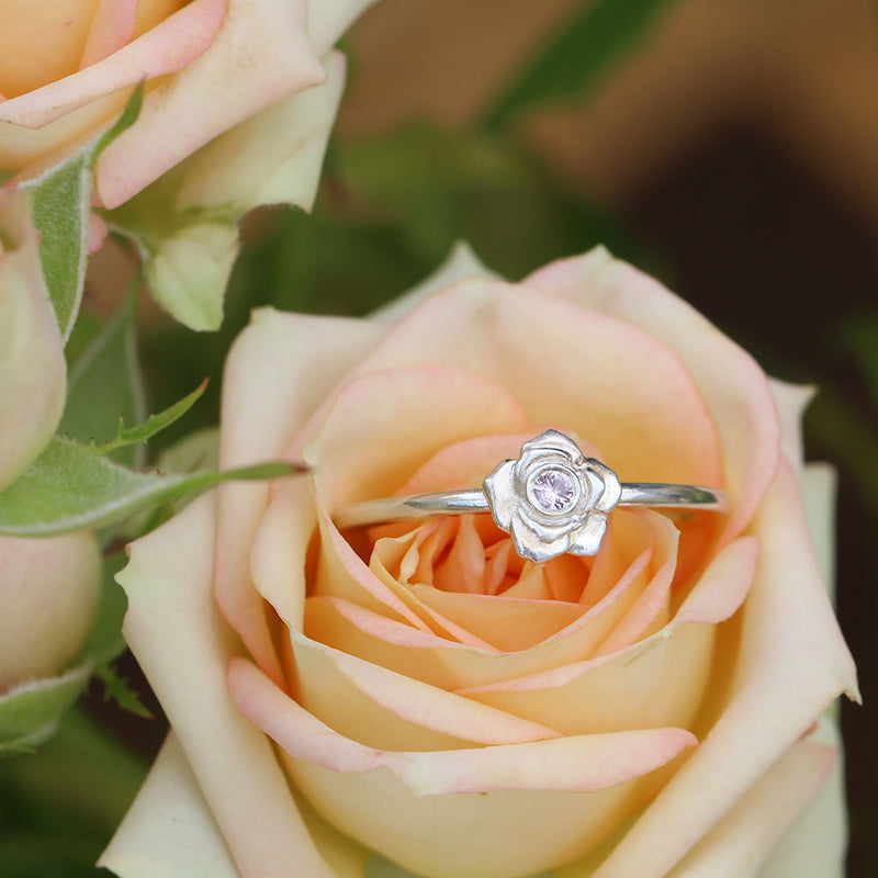 Rose ring with a pink sapphire in sterling silver