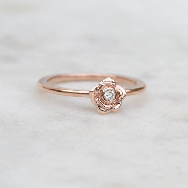rose ring with a diamond in rose gold