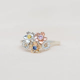 Flower bouquet ring with sapphires