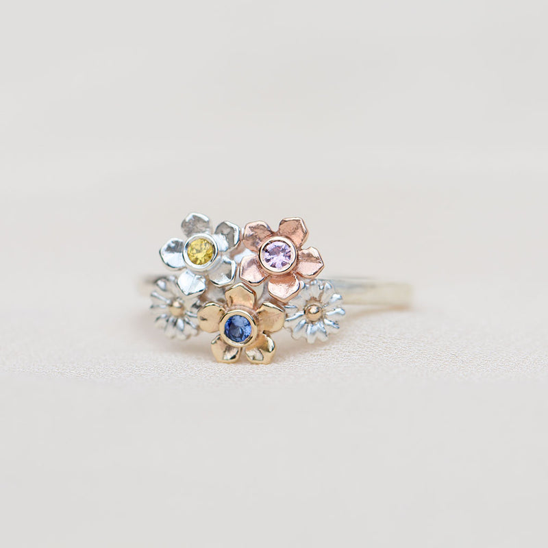 Flower bouquet ring with sapphires
