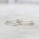 Silver fern engagement ring and silver fern wedding ring in white gold