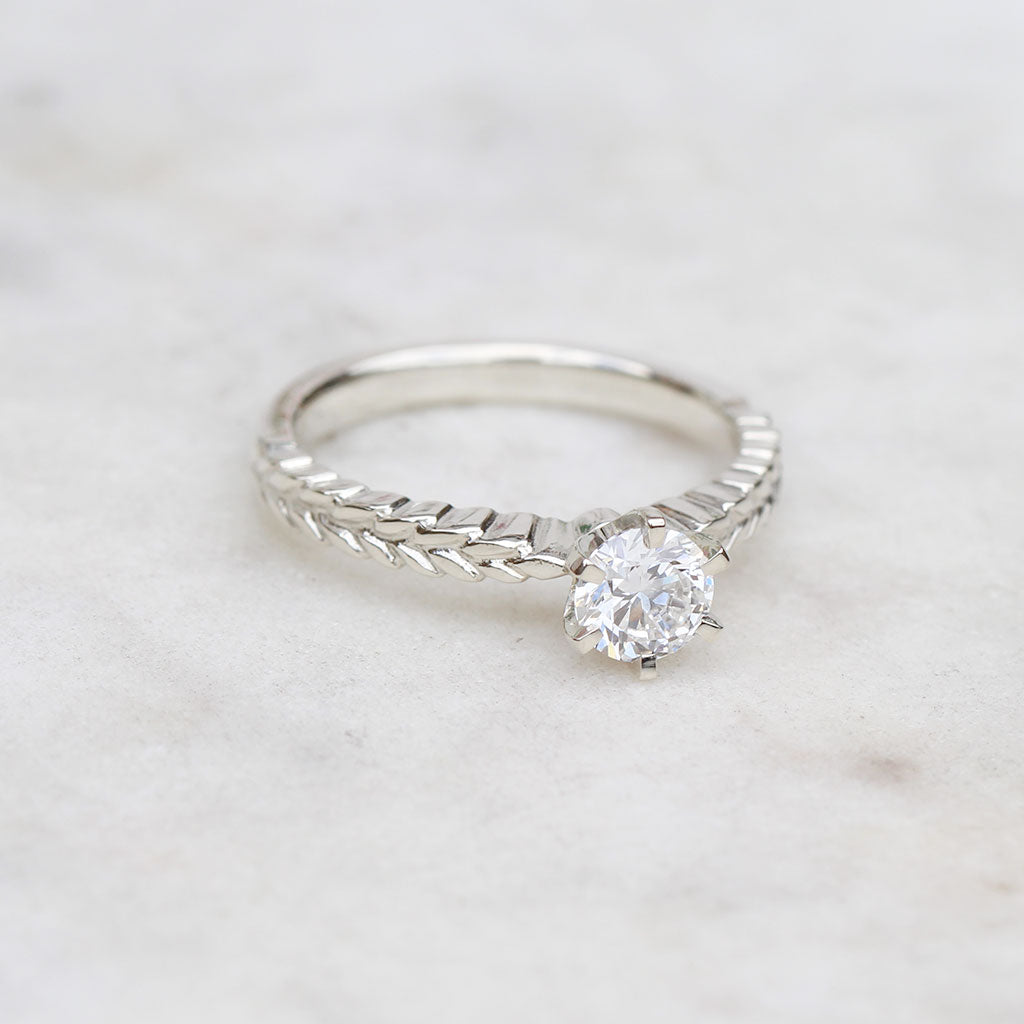 Diamond silver fern white gold ring