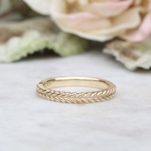 Silver fern ring in gold