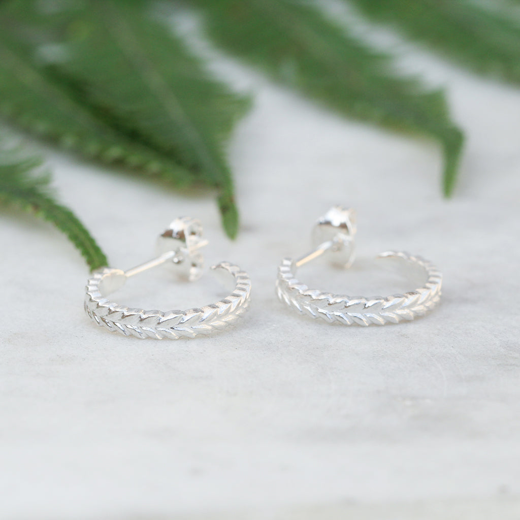 Silver fern hoop earrings in sterling silver