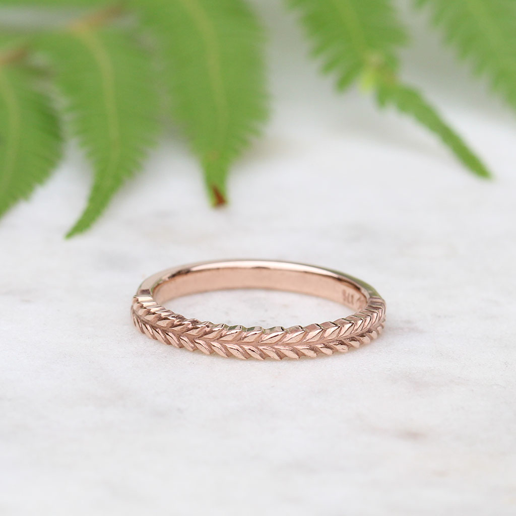 Silver fern wedding ring in rose gold