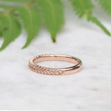 Silver fern wedding ring in rose gold
