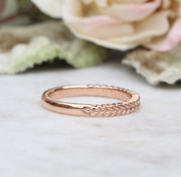 Silver fern wedding ring in rose gold