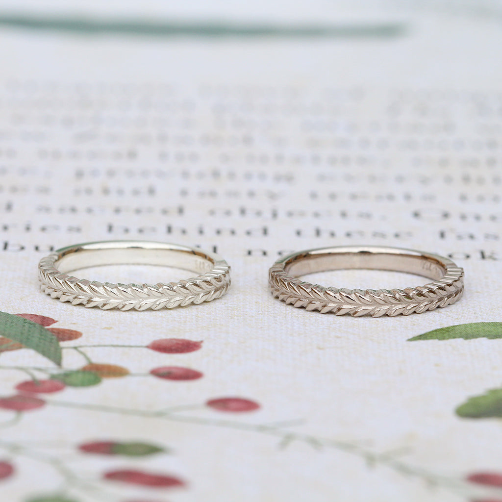 Silver fern wedding rings in white gold