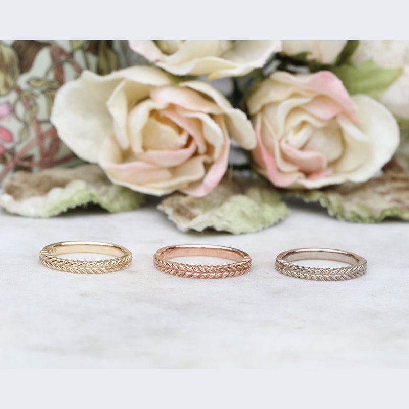 Silver fern rings in gold