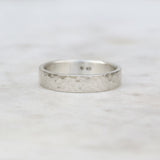 Wide hammered ring with a flat profile