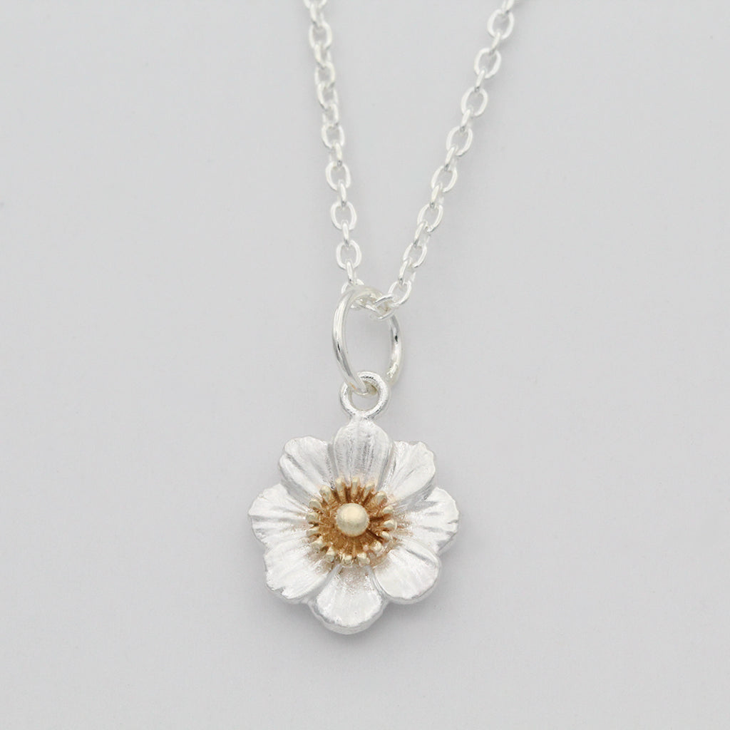 Mount Cook lily necklace in gold and silver