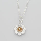Mount Cook lily necklace in gold and silver