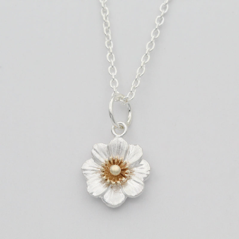 Mount Cook lily necklace in gold and silver