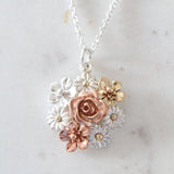 flower bouquet necklace in gold and silver