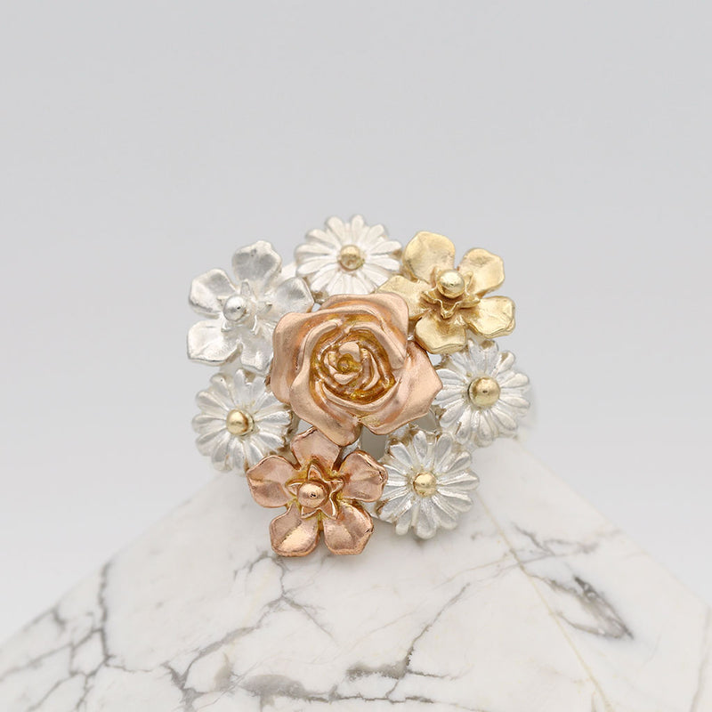 flower bouquet ring in gold, silver and rose gold