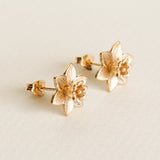 daffodil stud earrings gold