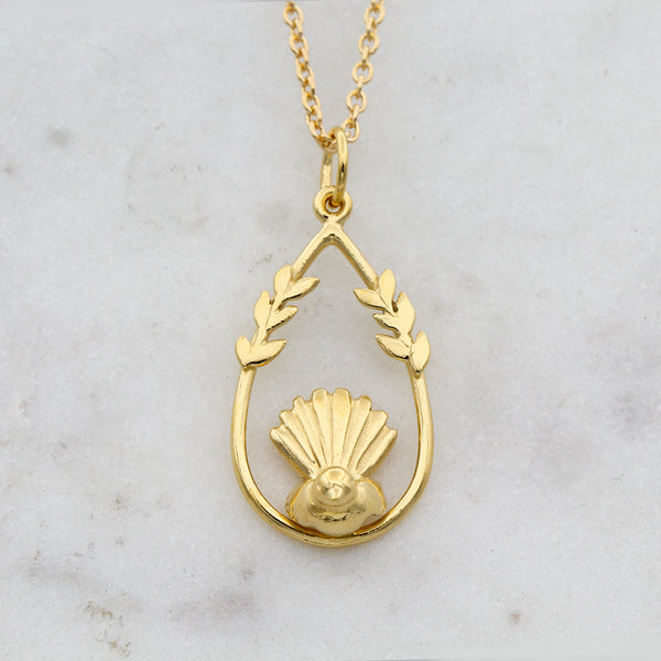 fantail bird necklace in gold plated silver
