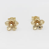 forget me not earrings in gold