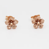 forget me not earrings in rose gold