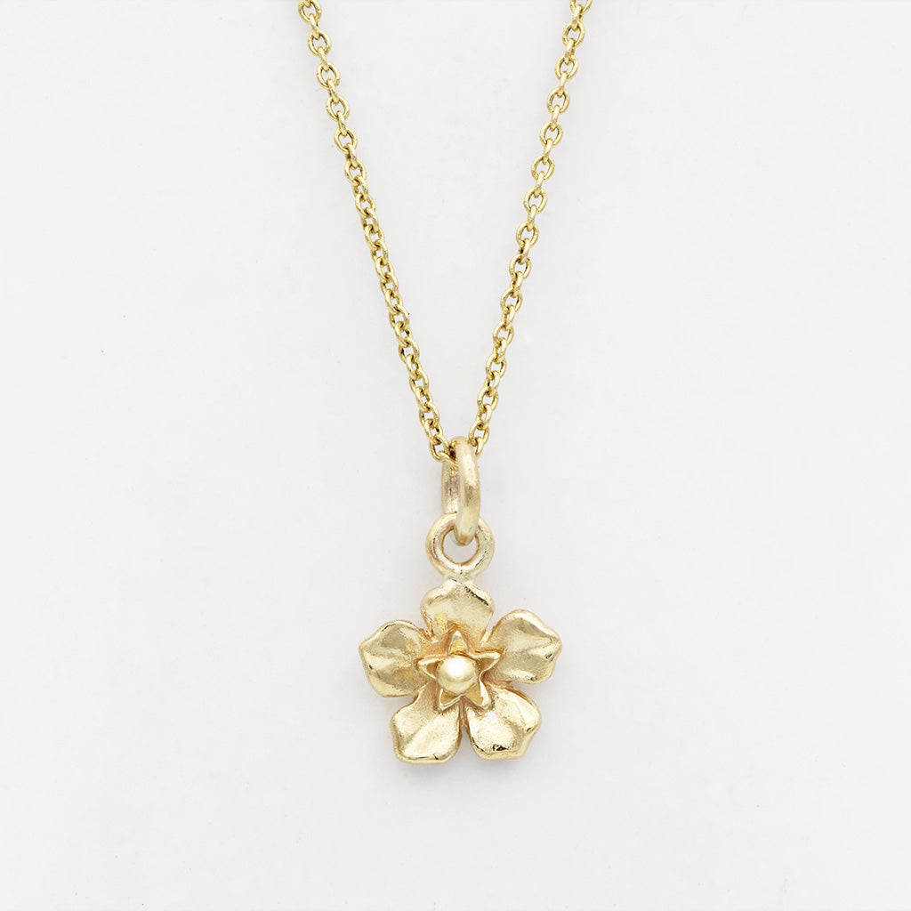 forget me not necklace in gold
