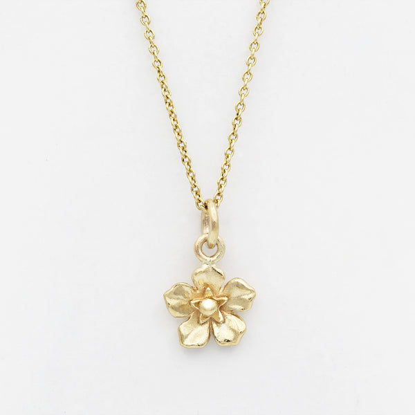forget me not necklace in gold