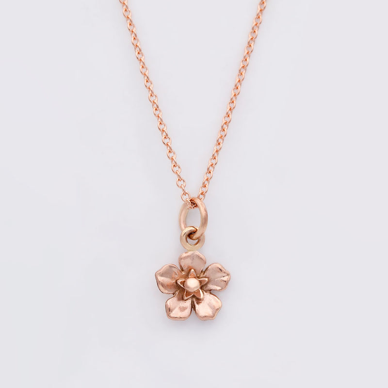 forget me not necklace in rose gold
