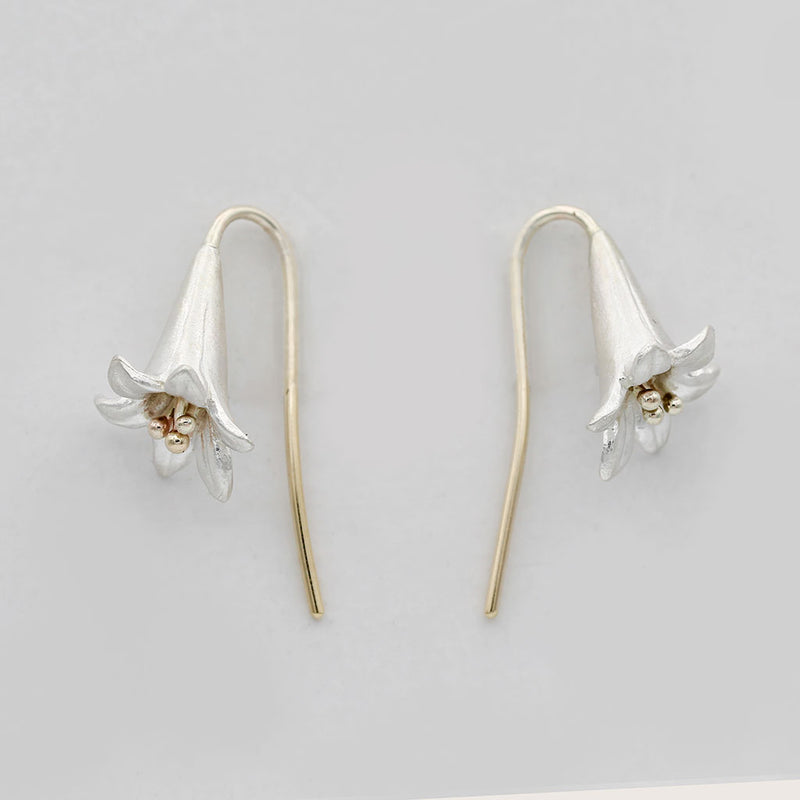 lily earrings in gold and silver