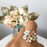 small flower bouquet ring in rose gold, yellow gold and silver