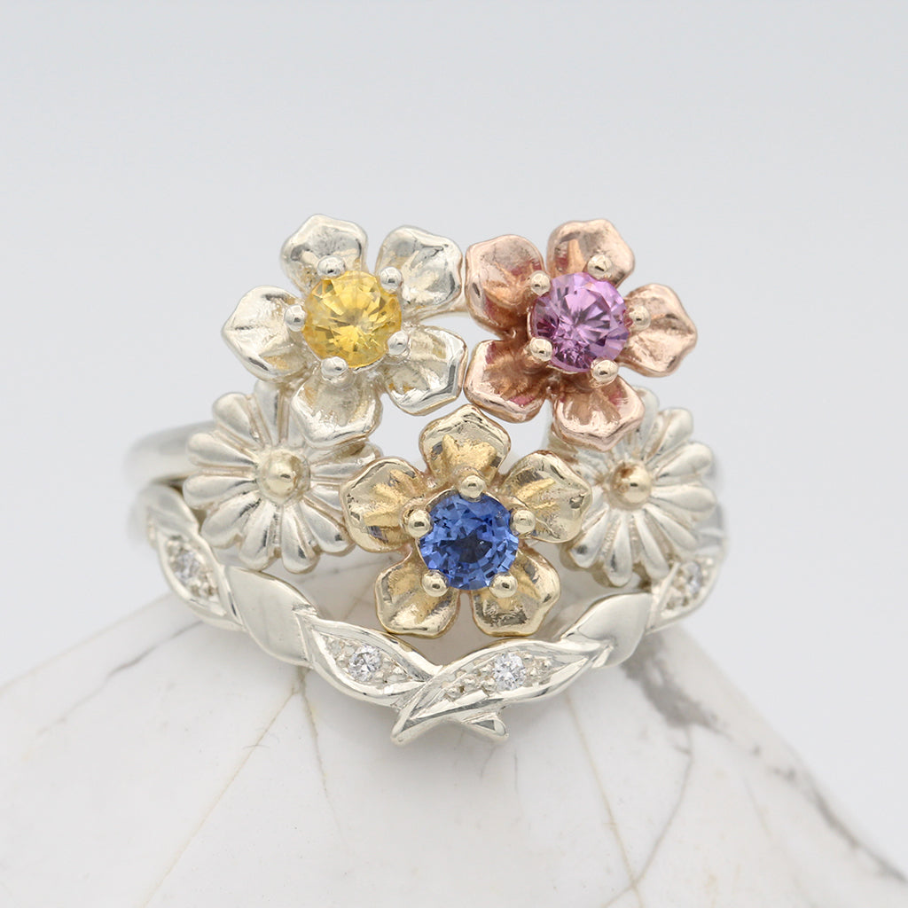flower bouquet engagement ring and leaf wedding ring